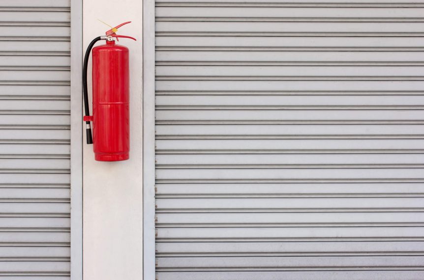 Fire extinguisher on the shutter door